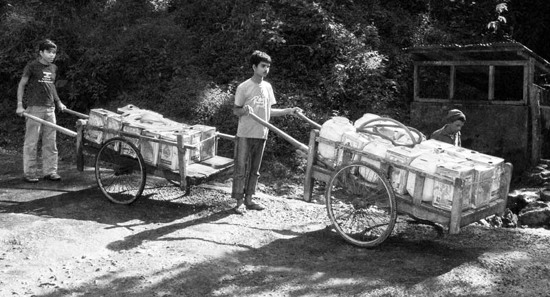 Home delivery of water collected from mountain springs on hand-driven carts in Kohima - an adaptation to persistent water crisis in the beautiful mountain capital of Kohima, Nagaland